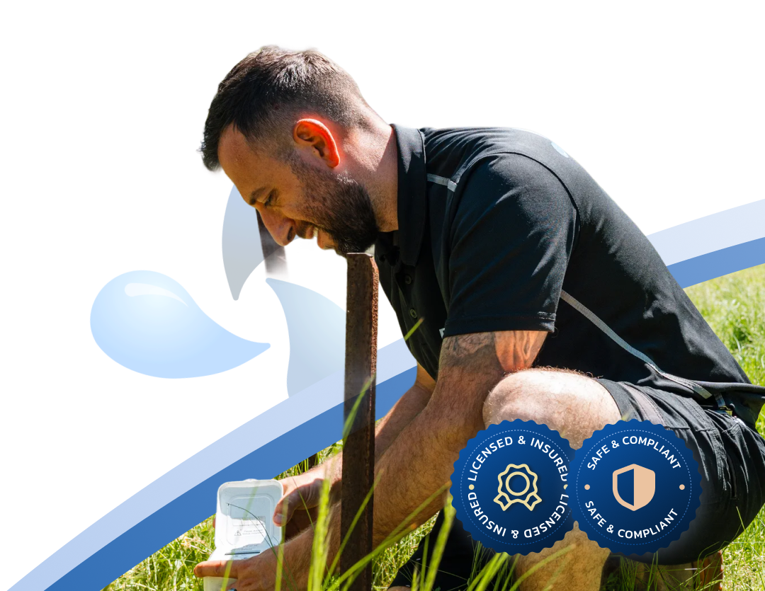 DYLSAL plumber inspecting and repairing a burst pipe in a Sydney yard